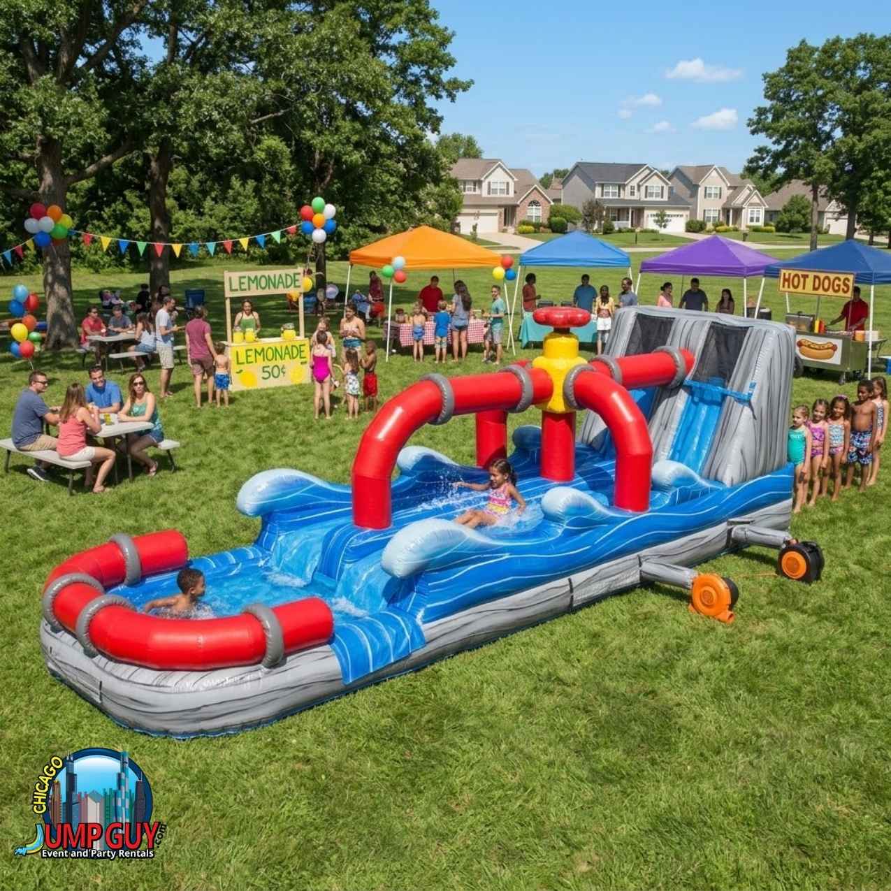 Inflatable horizontal slip-and-slide with a faucet archway and a splash pool set up on a grassy lawn.
